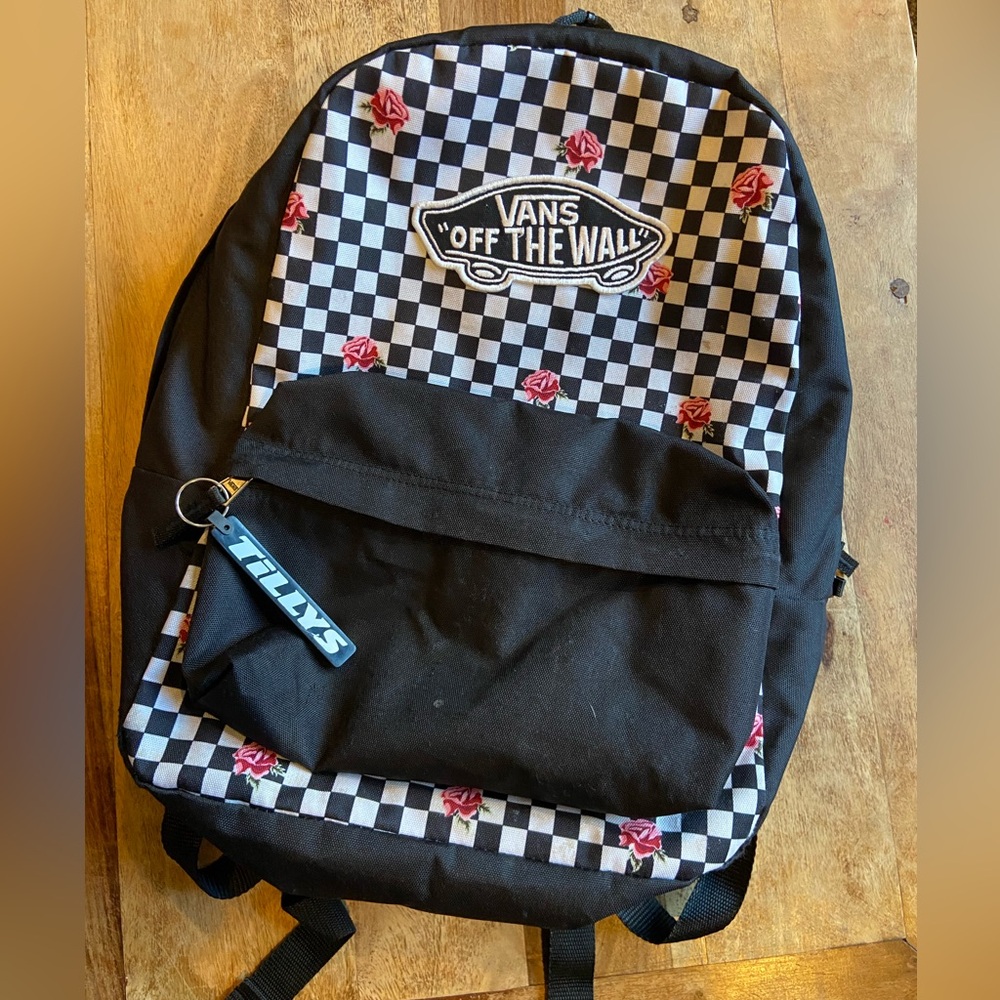 Vans Checkerboard roses black backpack. Good condition.